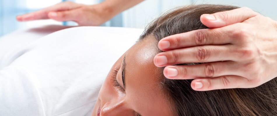 Woman receiving healing for what's intuitive energy