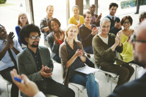 Audience clapping for authentic appreciation and love languages in the workplace