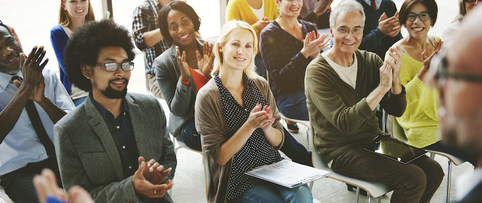 Audience clapping for authentic appreciation and love languages in the workplace