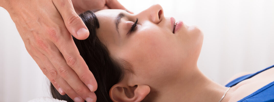 woman receiving an energy healing session