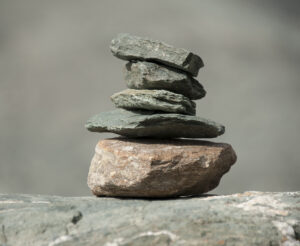Stacked stones for get grounded to anchor and expand your potential