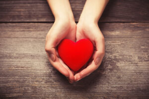 Heart in the hands for sending distance reiki healing to others or a troubled relationship