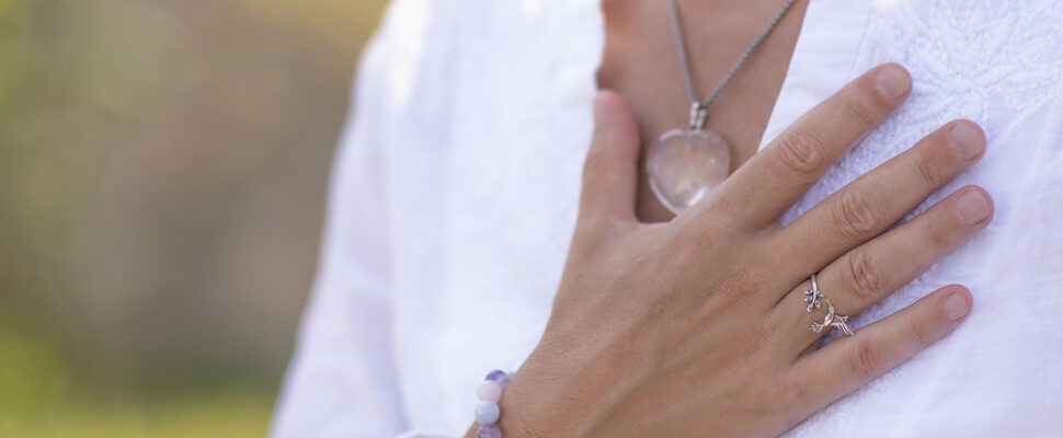 Hand on the heart or Anahata for how to balance your heart chakra