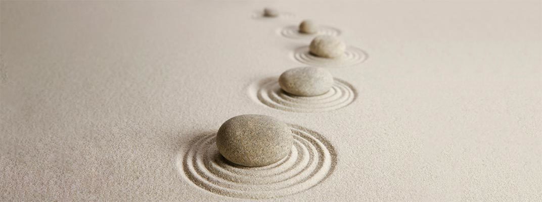 Stone path in sand of what is spiritual life coaching path