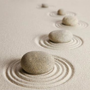 Stone path in sand of what is spiritual life coaching path