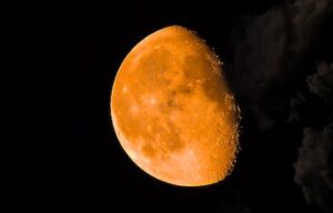 Orange waning Gibbous Moon for waning moon rituals to help you let go